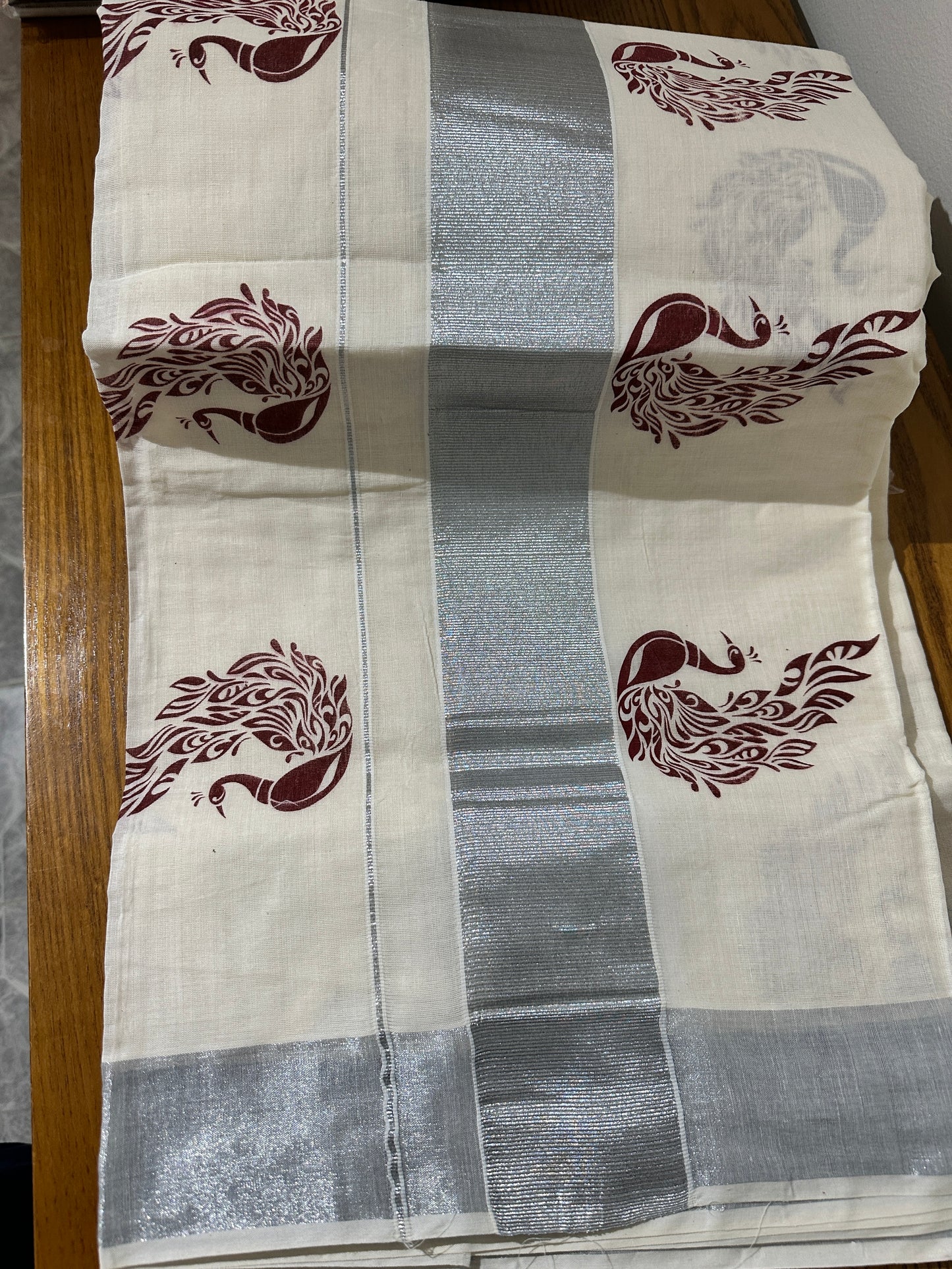 Set saree with peacock pattern | Maroon