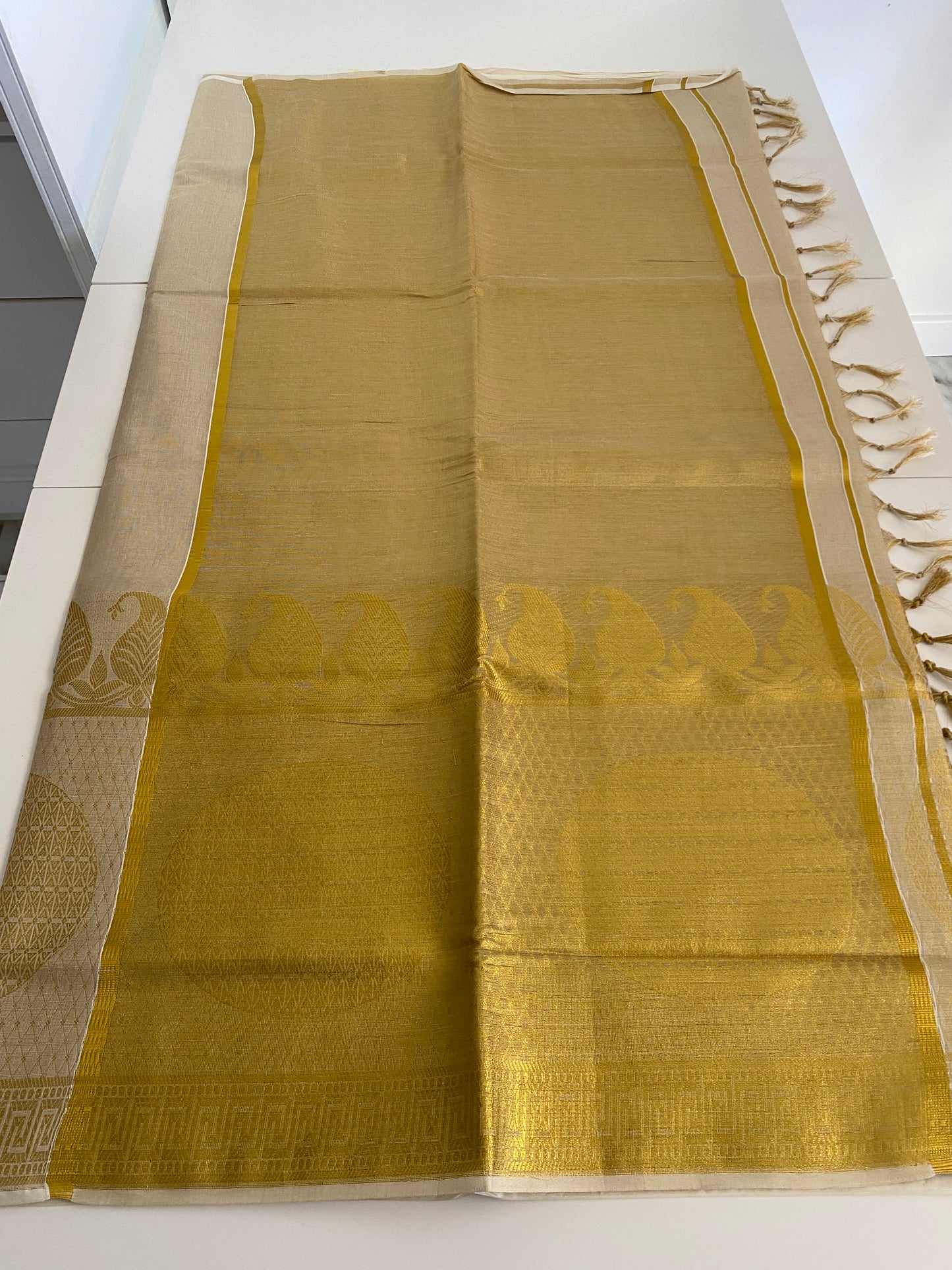 Golden Big Border Onam Saree with Unique Style