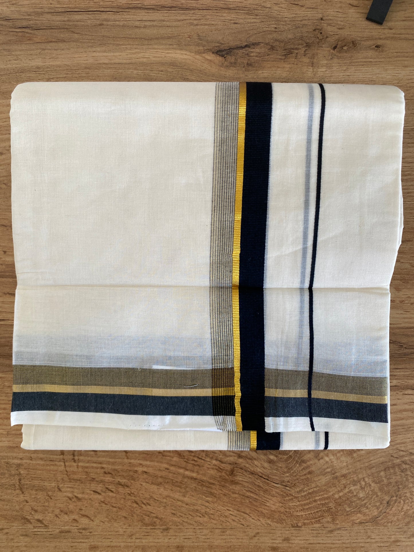 Handloom Kerala Cotton Mundu for Gents with Black and Gold Zari Border