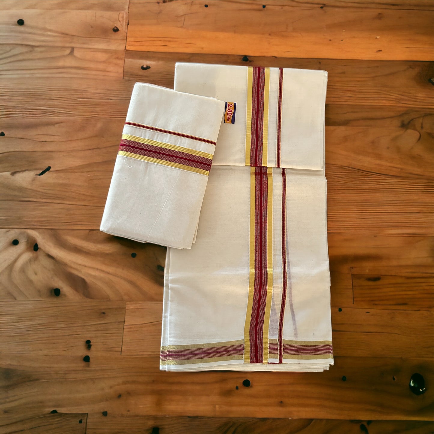 Set Mundu With Gold And Red Kara