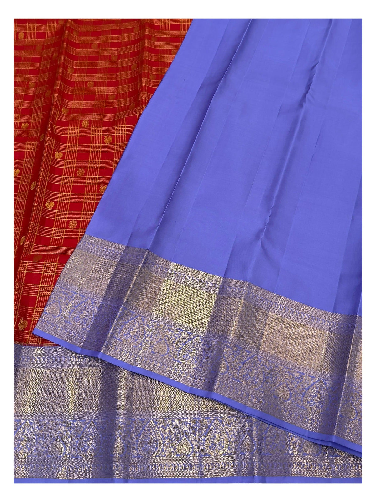 Handwoven Kanchipuram silk saree with lavender pallu and red checked body laid open