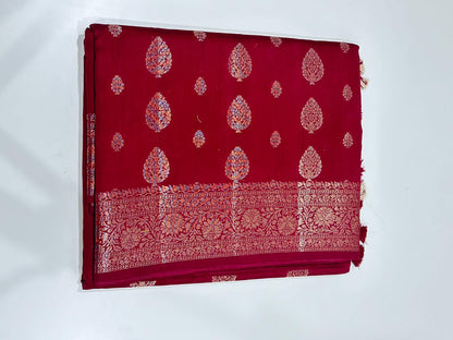 Maroon Fancy Chiniya silk saree with gold zari motifs and tassels