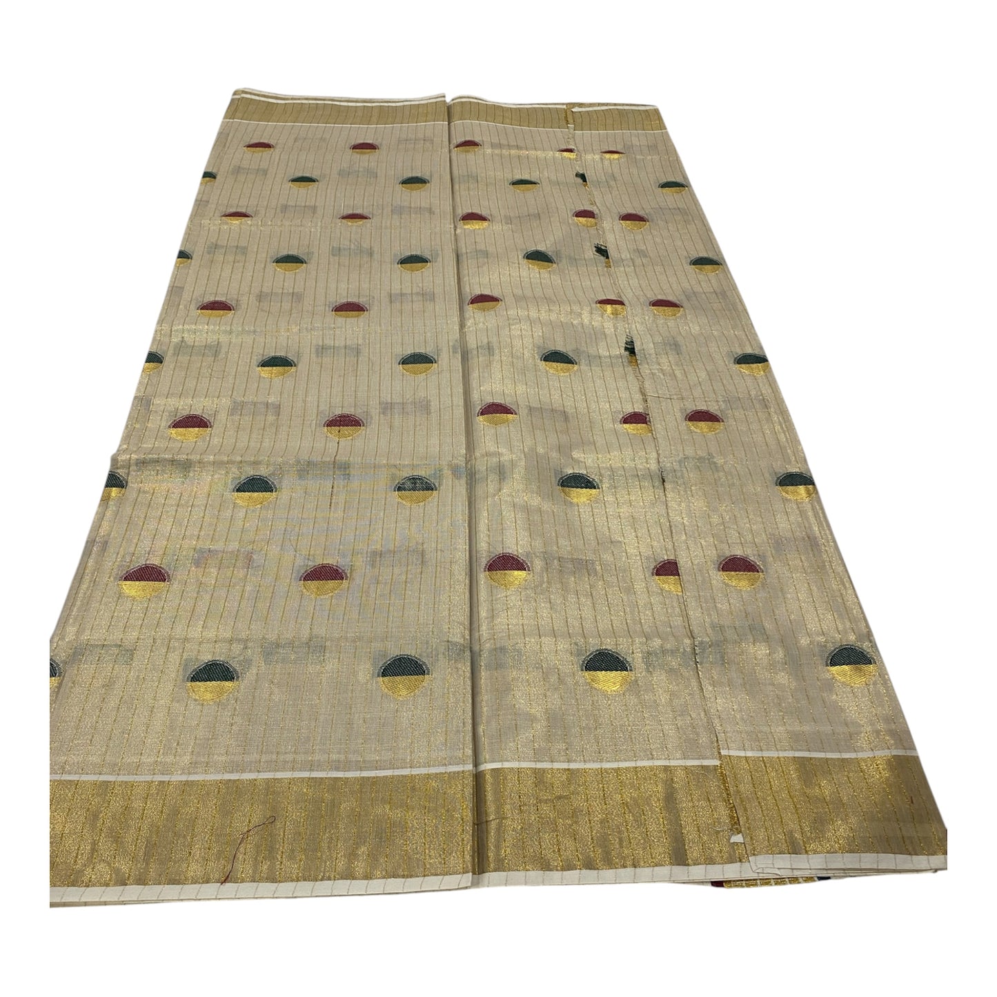 Onam Tissue Saree in Cream with Circle Buttas
