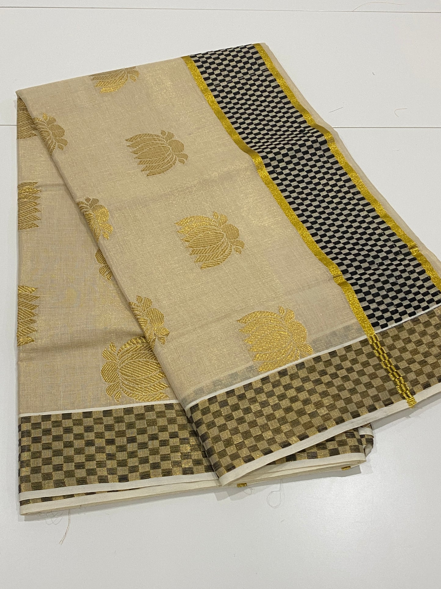 Premium Lotus Tissue Onam Saree with Black & Gold Border