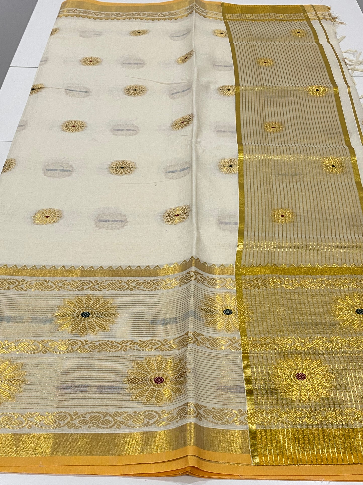 Premium Onam Cotton Saree in Off-White with Golden Floral Buttes