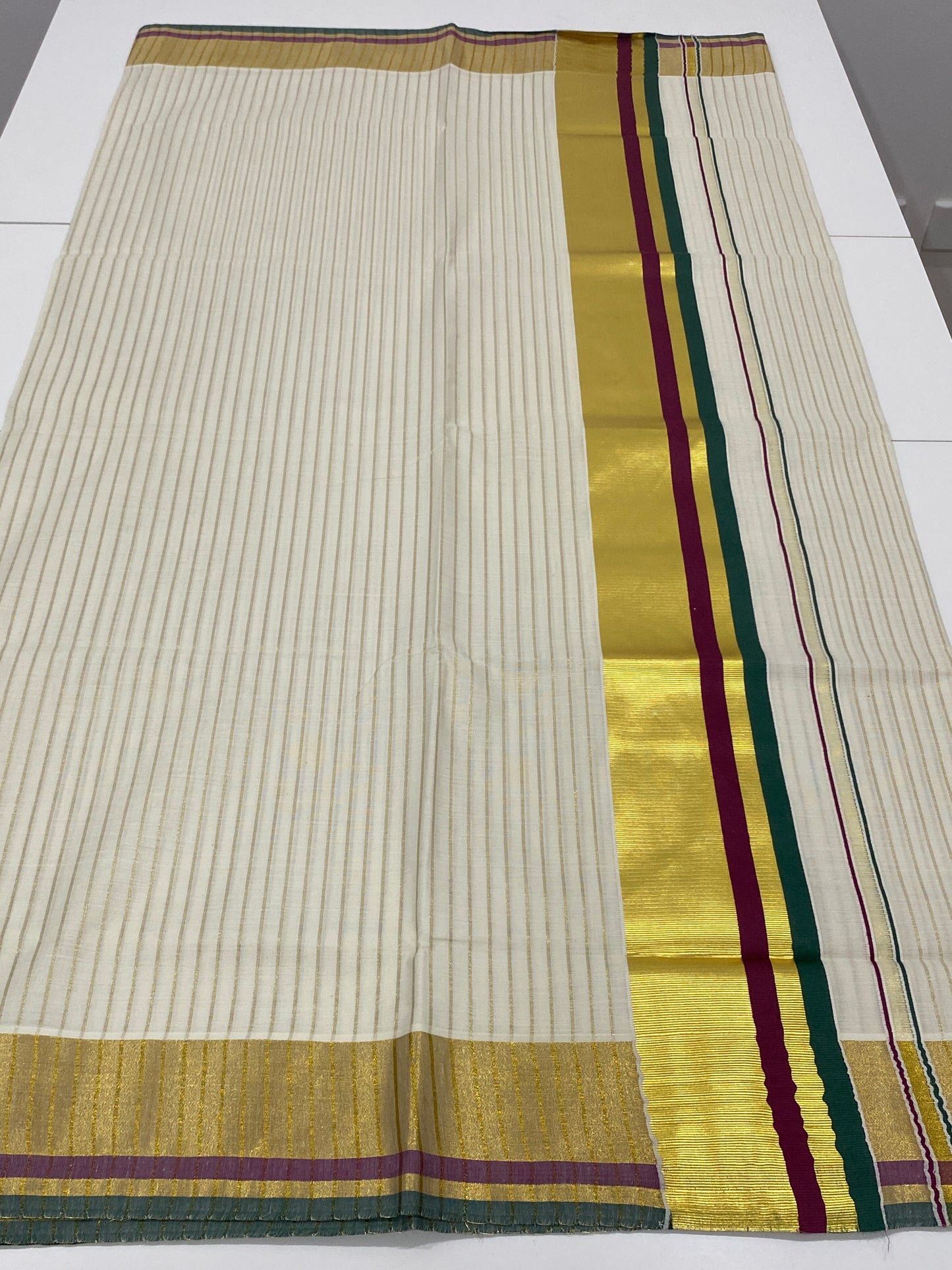Onam Cotton Saree in Off-White with Golden Stripes and Green Wine Pallu Lines