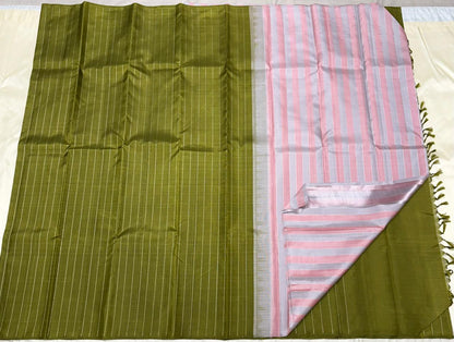 Green Kanchipuram Pure Silk Saree with Silver Stripes & Pink-Lavender Contrast Pallu – Handwoven & Silk Mark Certified