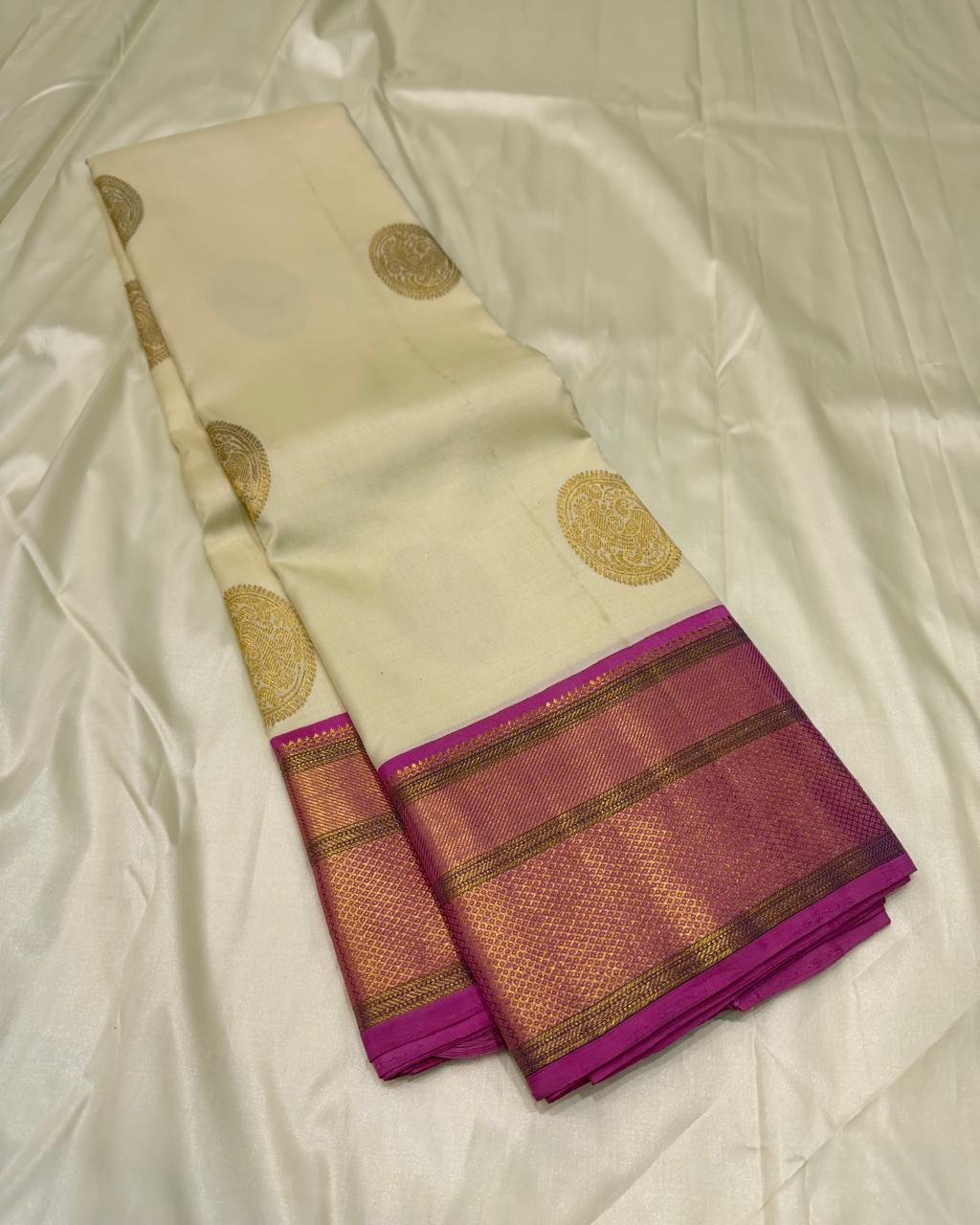 Traditional Kanchipuram silk saree in ivory with gold zari detailing