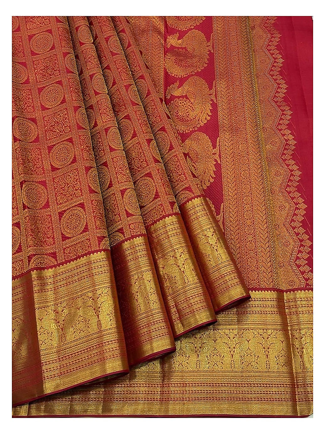 Deep Coral Pink Handwoven Kanchipuram Silk Saree with Floral Panel Weave and Broad Elephant Zari Border front view