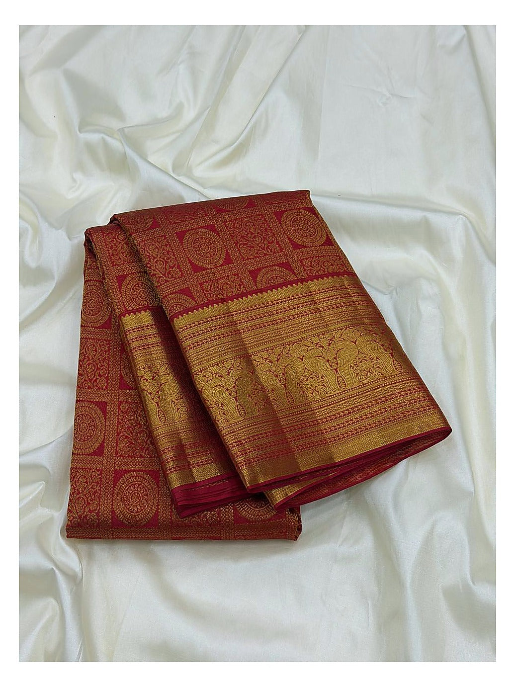 Deep Coral Pink Handwoven Kanchipuram Silk Saree with Floral Panel Weave and Broad Elephant Zari Border