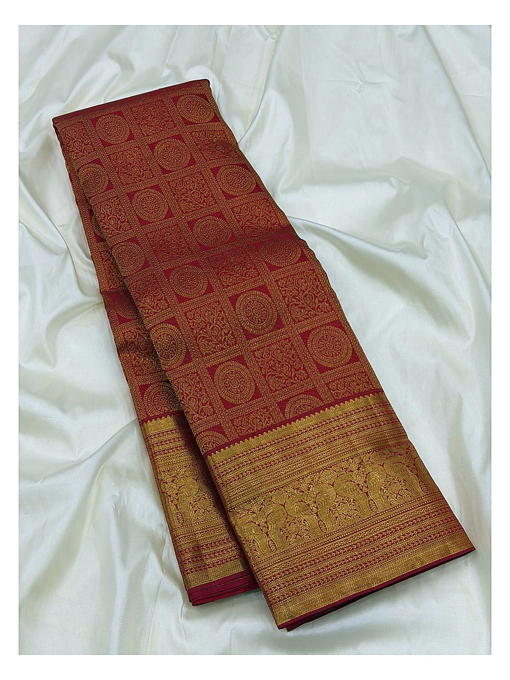 Deep Coral Pink Handwoven Kanchipuram Silk Saree with Floral Panel Weave and Broad Elephant Zari Border