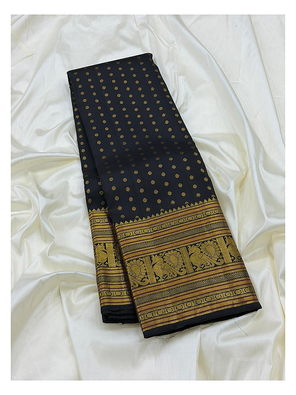 Deep Navy Handwoven Kanchipuram Silk Saree with Gold Buttas and Ornate Zari Border