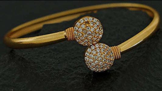Dual Circle Stone Bangle - Gold Finish with Clear Stones front view
