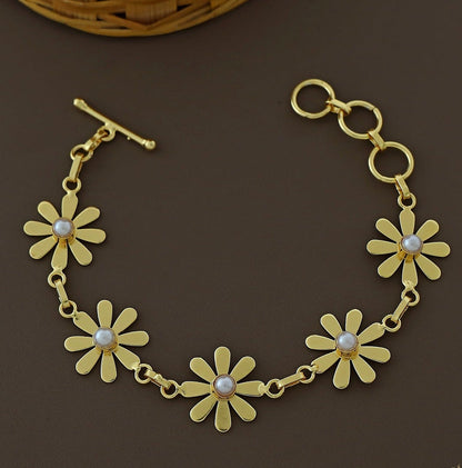 floral-bracelet-gold-tone-with-pearl-detail-front-01.jpg