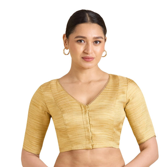 Woman wearing golden Banaras brocade V-neck readymade saree blouse with elbow sleeves