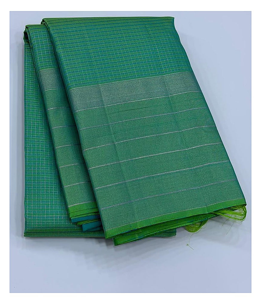 Green Handwoven Kanchipuram Silk Saree with Silver Zari Border front view