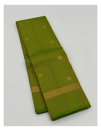 Green saree with gold checks, buttas and woven pallu front folded view