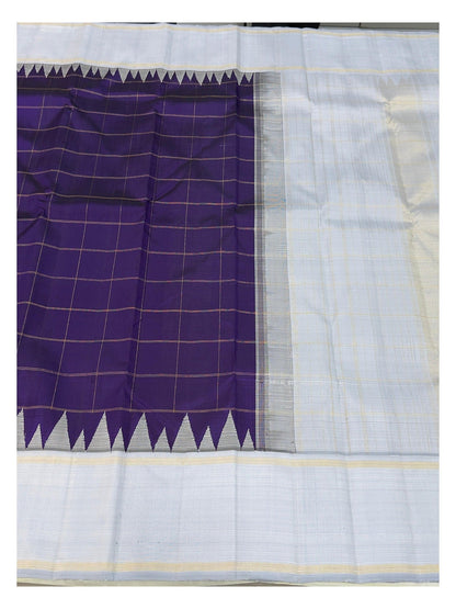 Open view showing the checked purple body and ice blue pallu of the handwoven Kanchipuram silk saree