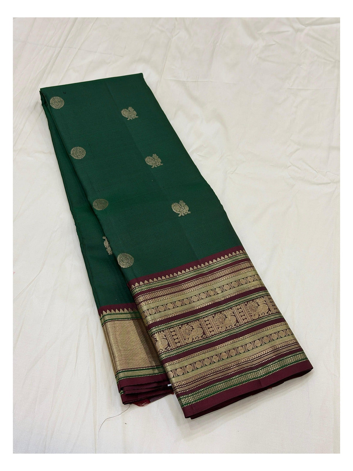 Handwoven Kanchipuram Silk Saree in Deep Green with Maroon Border