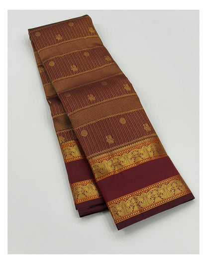 Handwoven Kanchipuram Silk Saree in Deep Wine with Gold Buttas and Ornate Woven Border