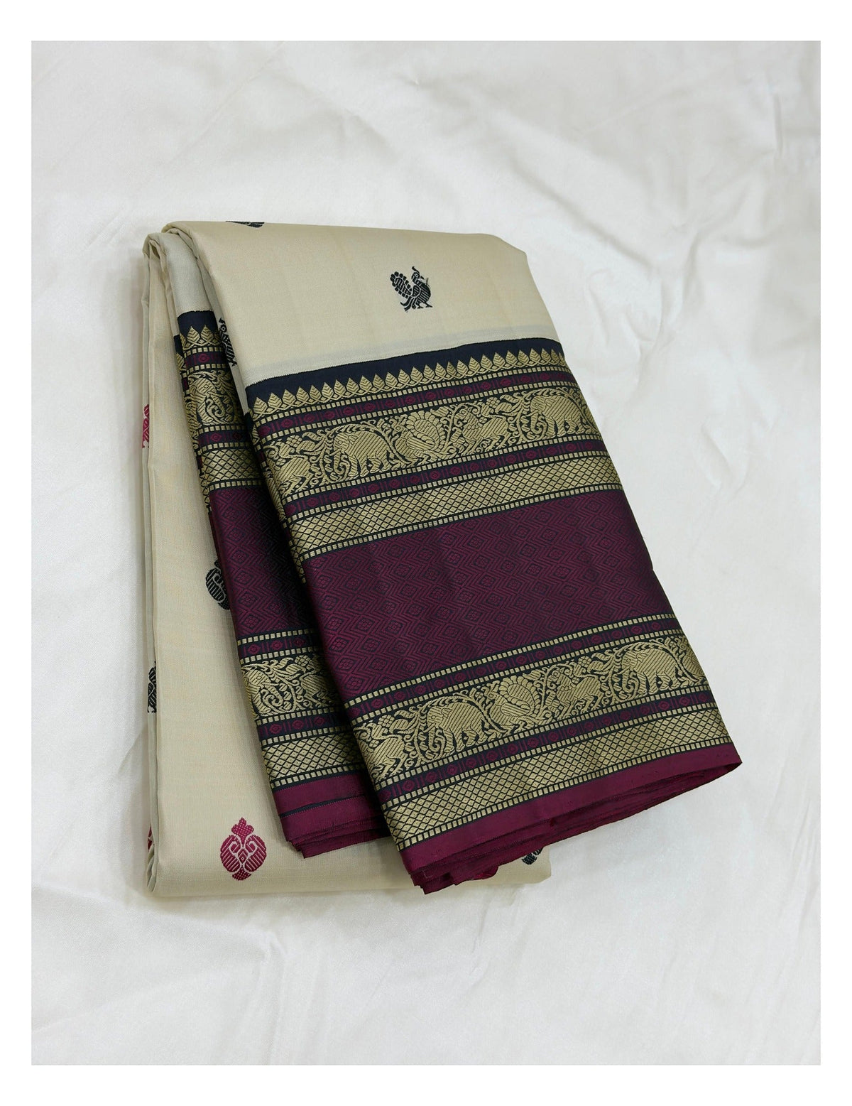 Handwoven Kanchipuram Silk Saree in Ivory with Black and Magenta Elephant Border front view