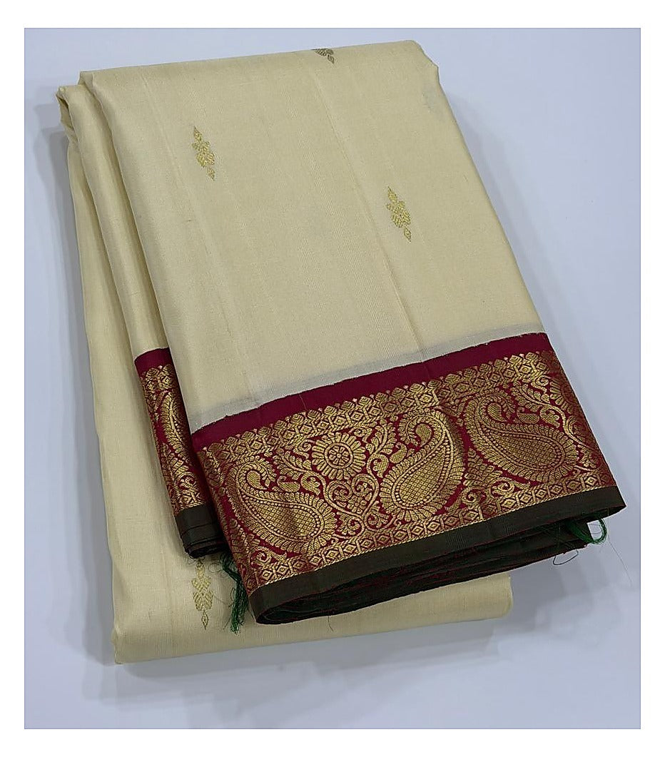 Handwoven Kanchipuram Silk Saree in Ivory with Magenta Zari Border front view
