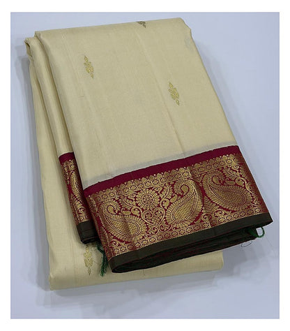 Handwoven Kanchipuram Silk Saree in Ivory with Magenta Zari Border front view