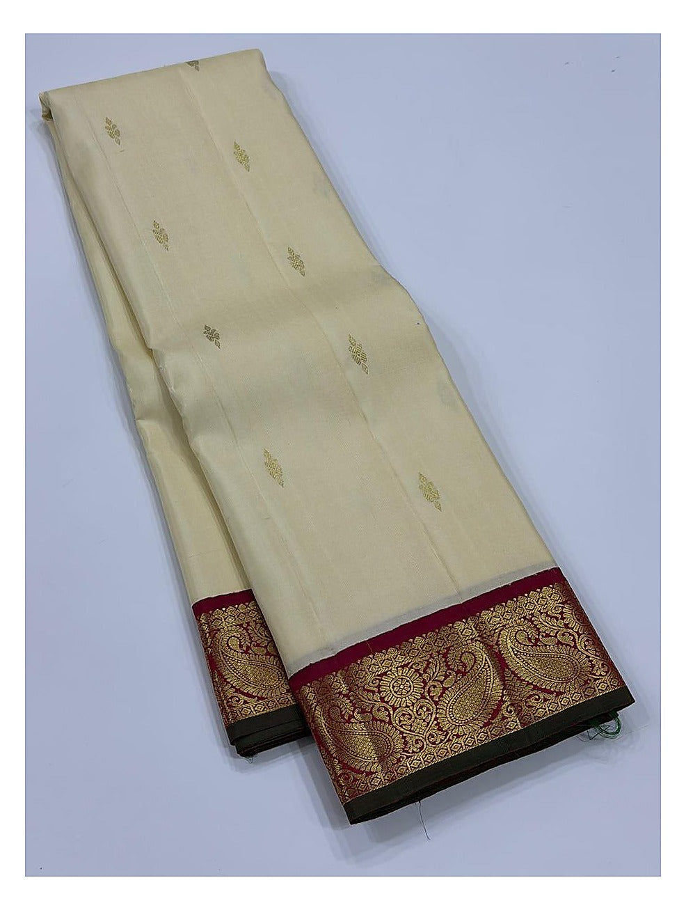 Handwoven Kanchipuram Silk Saree in Ivory with Magenta Zari Border