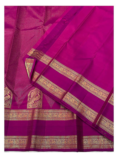 Handwoven Kanchipuram Silk Saree in Magenta Pink with Gold Zari Peacock Border