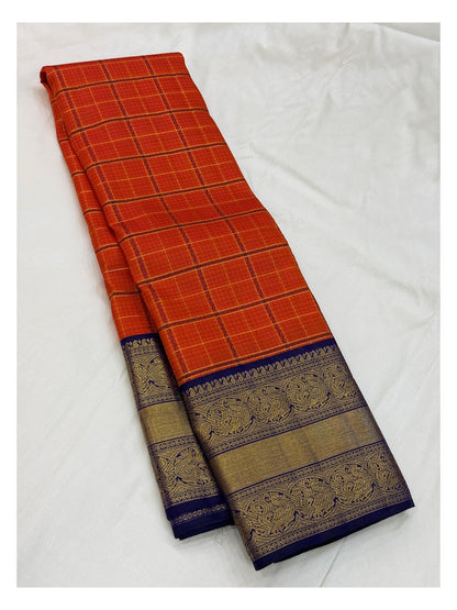 Handwoven Kanchipuram Silk Saree in Orange Checks with Royal Blue Peacock Border