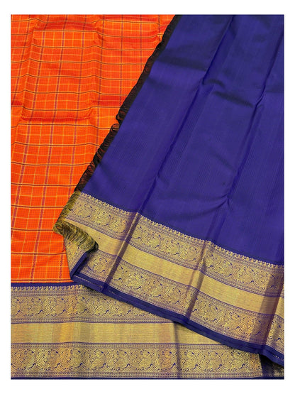 Handwoven Kanchipuram Silk Saree in Orange Checks with Royal Blue Peacock Border