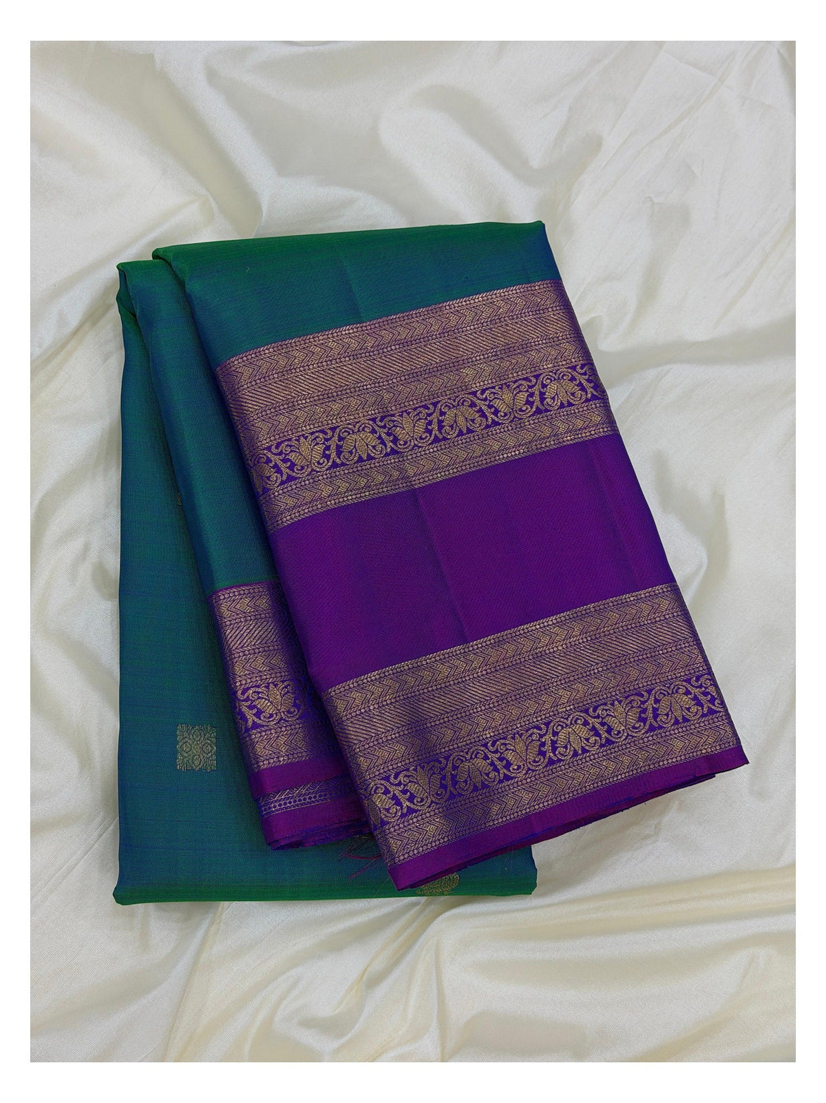 Handwoven Kanchipuram Silk Saree in Peacock Green with Royal Purple Zari Border front view