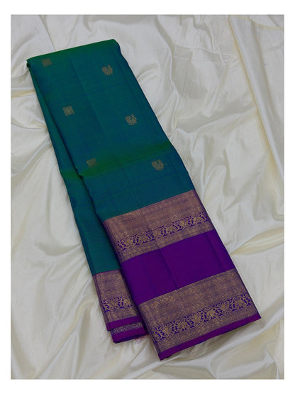 Handwoven Kanchipuram Silk Saree in Peacock Green with Royal Purple Zari Border