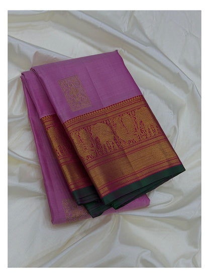 Handwoven Kanchipuram Silk Saree in Pink with Zari Border front view