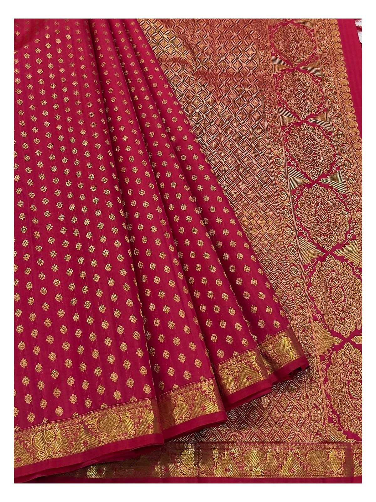 Rani pink handwoven silk saree with richly woven zari pallu and gold butta body