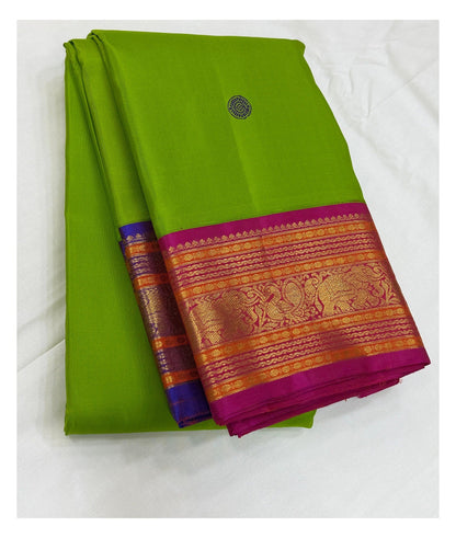 Handwoven Kanchipuram Silk Saree - Parrot Green with Magenta Contrast Border front view