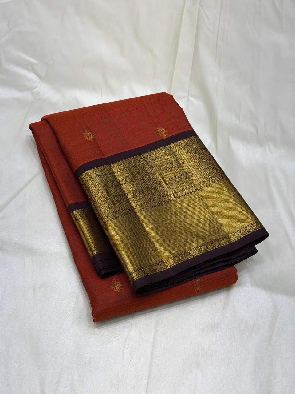 Bridal Kanchipuram saree with diamond lattice zari design
