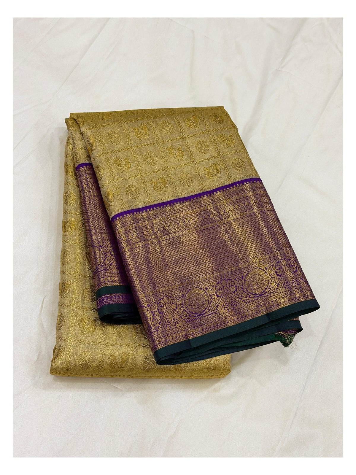 Handwoven Kanchipuram silk saree with gold zari body and purple zari border