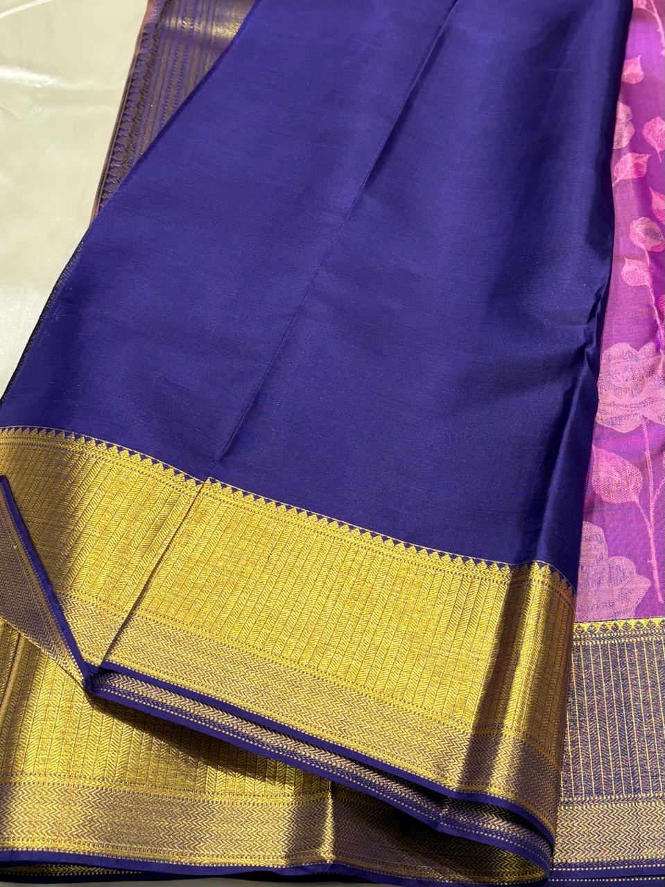 Handwoven silk saree with floral designs and zari pallu – close-up