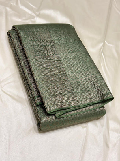 Elegant handwoven Kanchipuram silk saree with intricate zari patterns