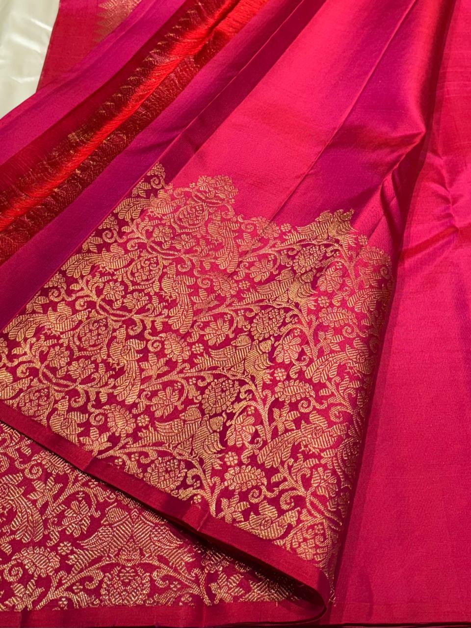 Traditional Kanchipuram silk saree with buttas and zari motifs