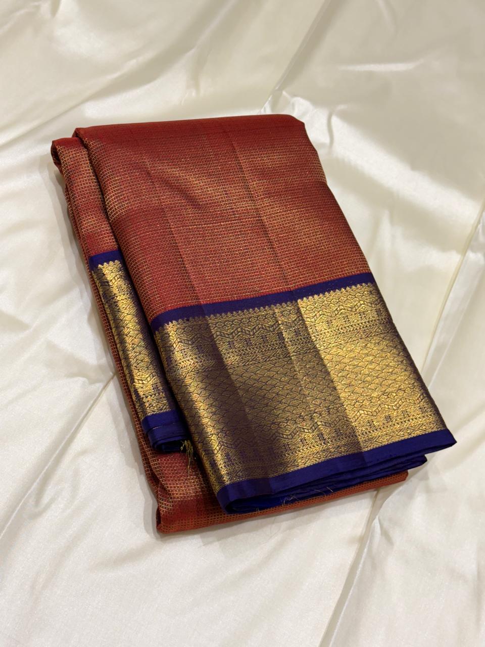 Pure silk Kanchipuram saree in red and blue with gold weaving
