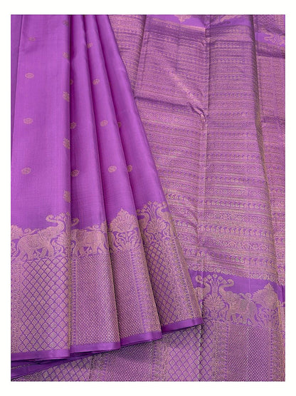 Magenta Handwoven Kanchipuram Silk Saree with Gold Butta Motifs and Broad Elephant Zari Border front view