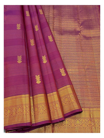Magenta Handwoven Kanchipuram Silk Saree with Gold Butta Motifs and Broad Paisley Zari Border front view