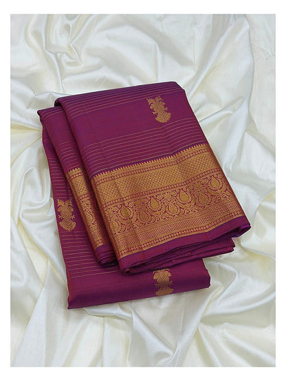 Magenta Handwoven Kanchipuram Silk Saree with Gold Butta Motifs and Broad Paisley Zari Border