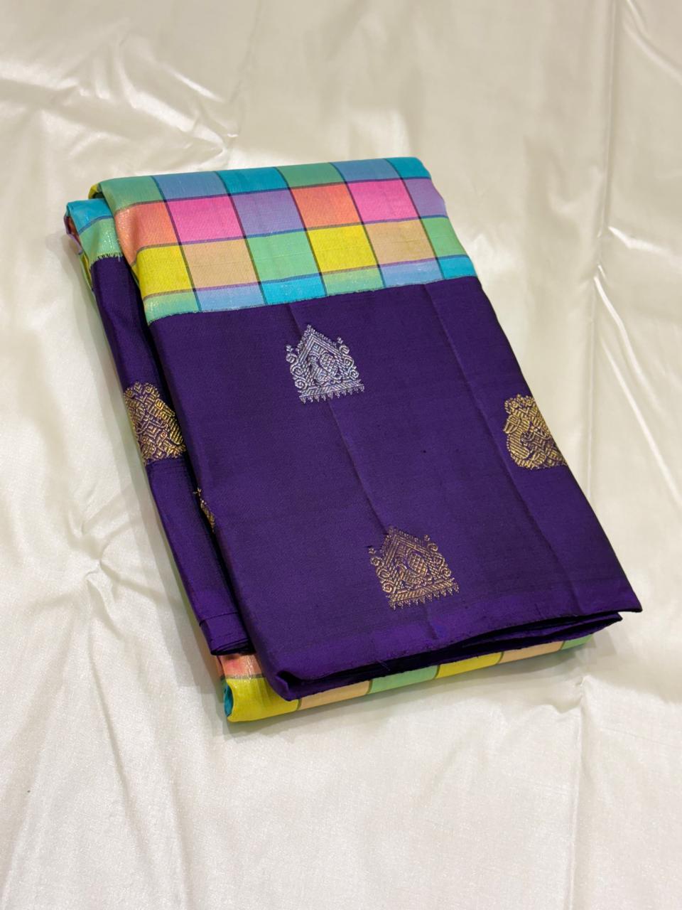 Handwoven pure silk saree with pastel checks and purple zari pallu