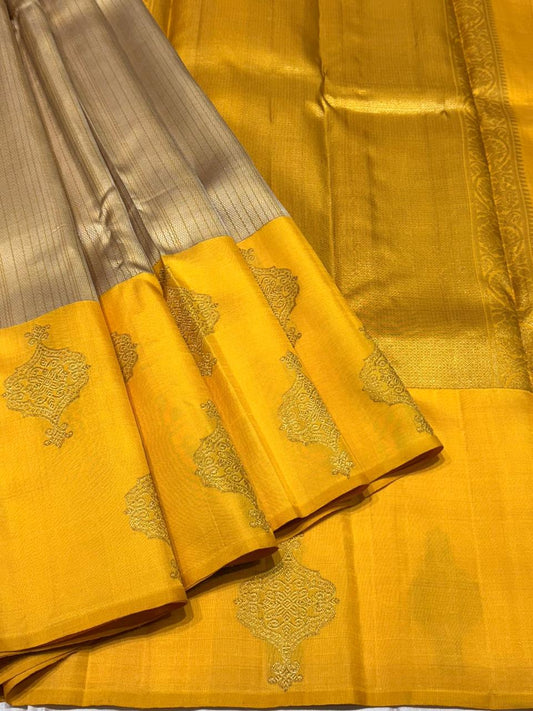 Mustard yellow Kanchipuram silk saree with silver-grey border and golden zari pallu – full view