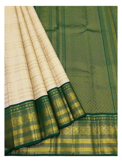 Off-White Handwoven Kanchipuram Silk Saree with Emerald Green Zari Border