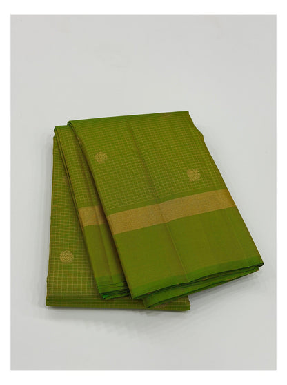 Green saree with gold checks, round butta motifs and woven gold border front view