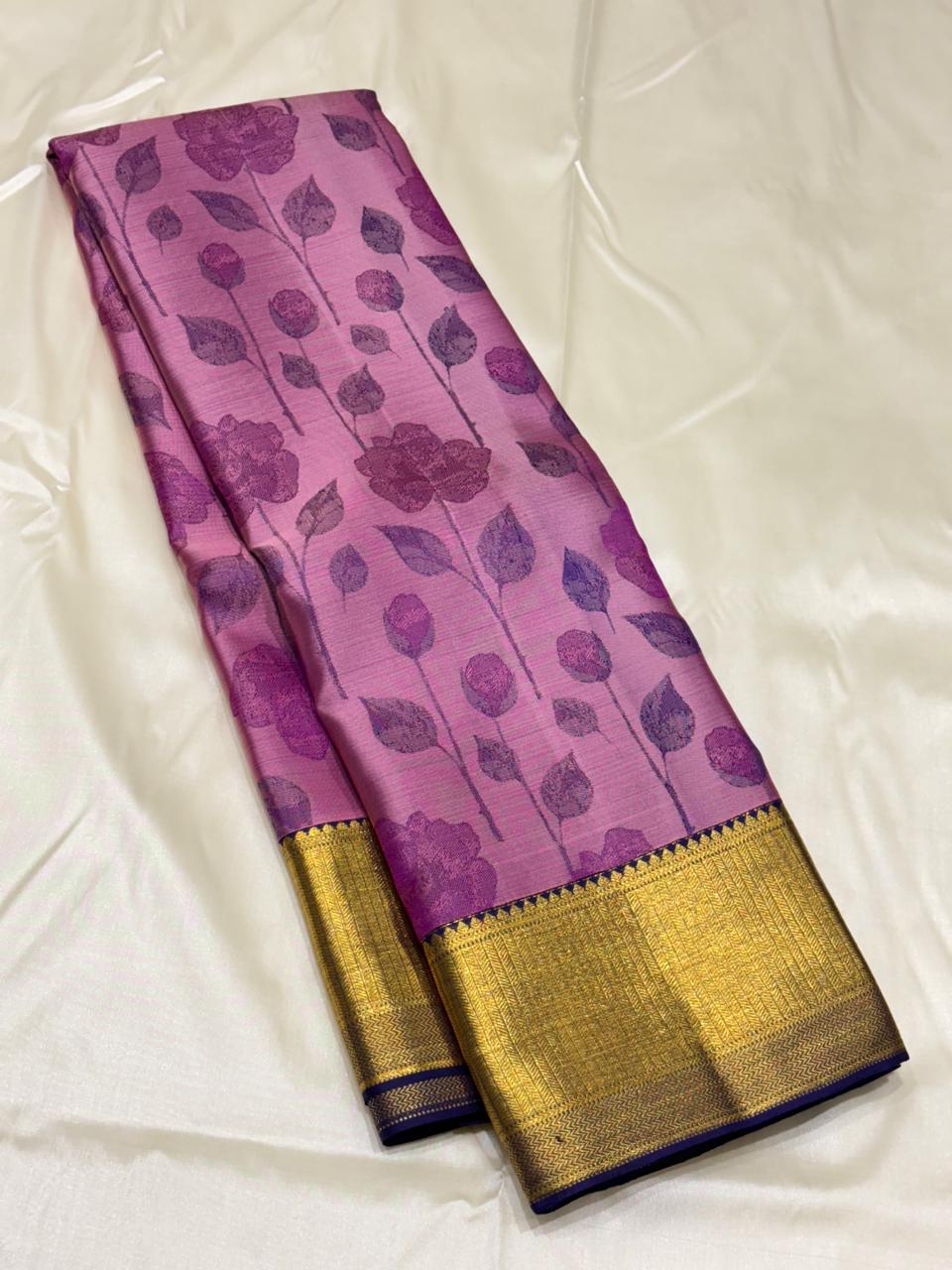 Elegant handwoven saree with zari border and floral body